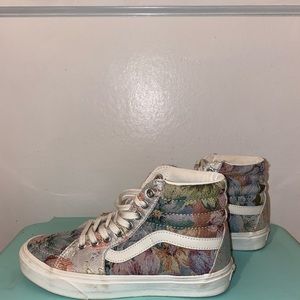 Lace floral design on a high top Van’s sneaker